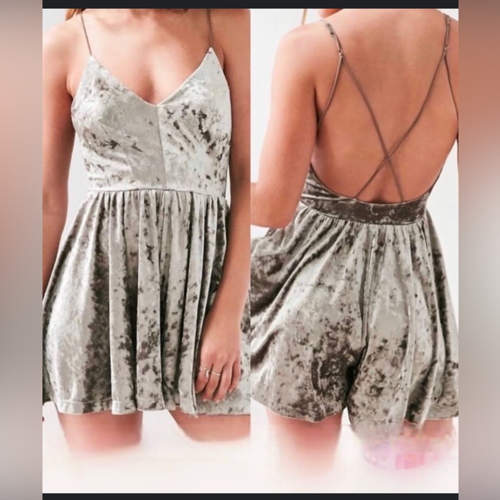 Crushed velvet romper size small. Never worn but took tags off